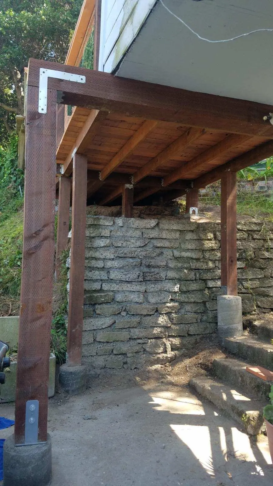 Engineered framing over stacked stone
